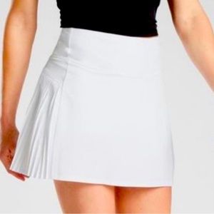 Athleta A-line  flat front pleated back skort